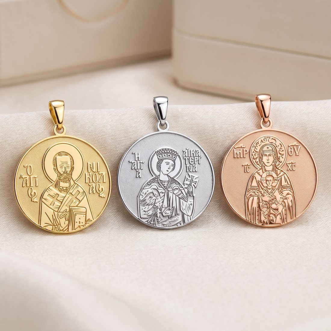 The same medal in yellow gold, sterling silver and rose gold