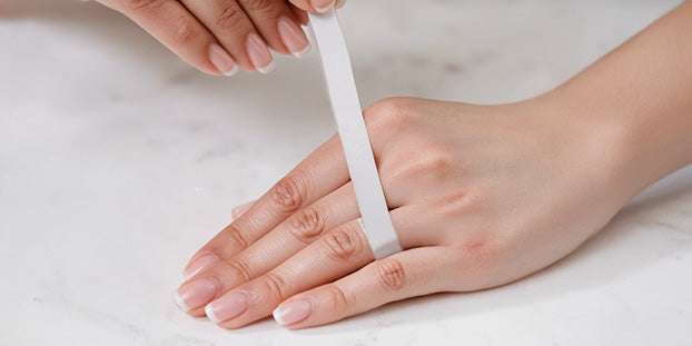 Measuring a finger with a strip of paper